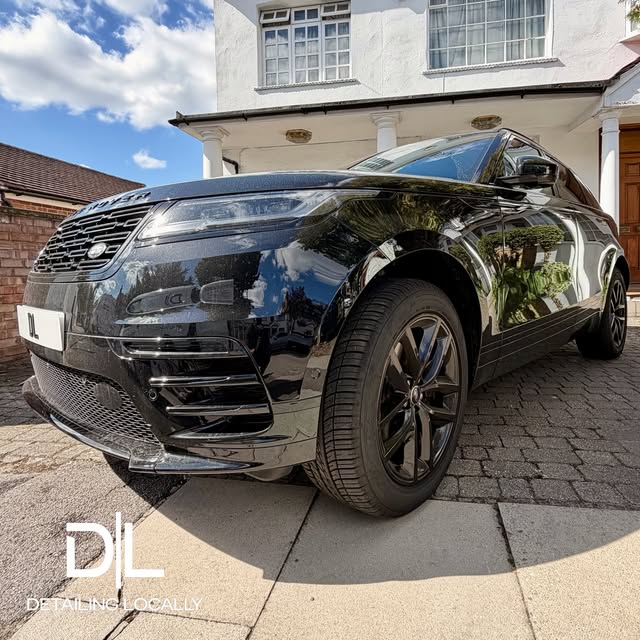 Black Range Rover Velar after a detail